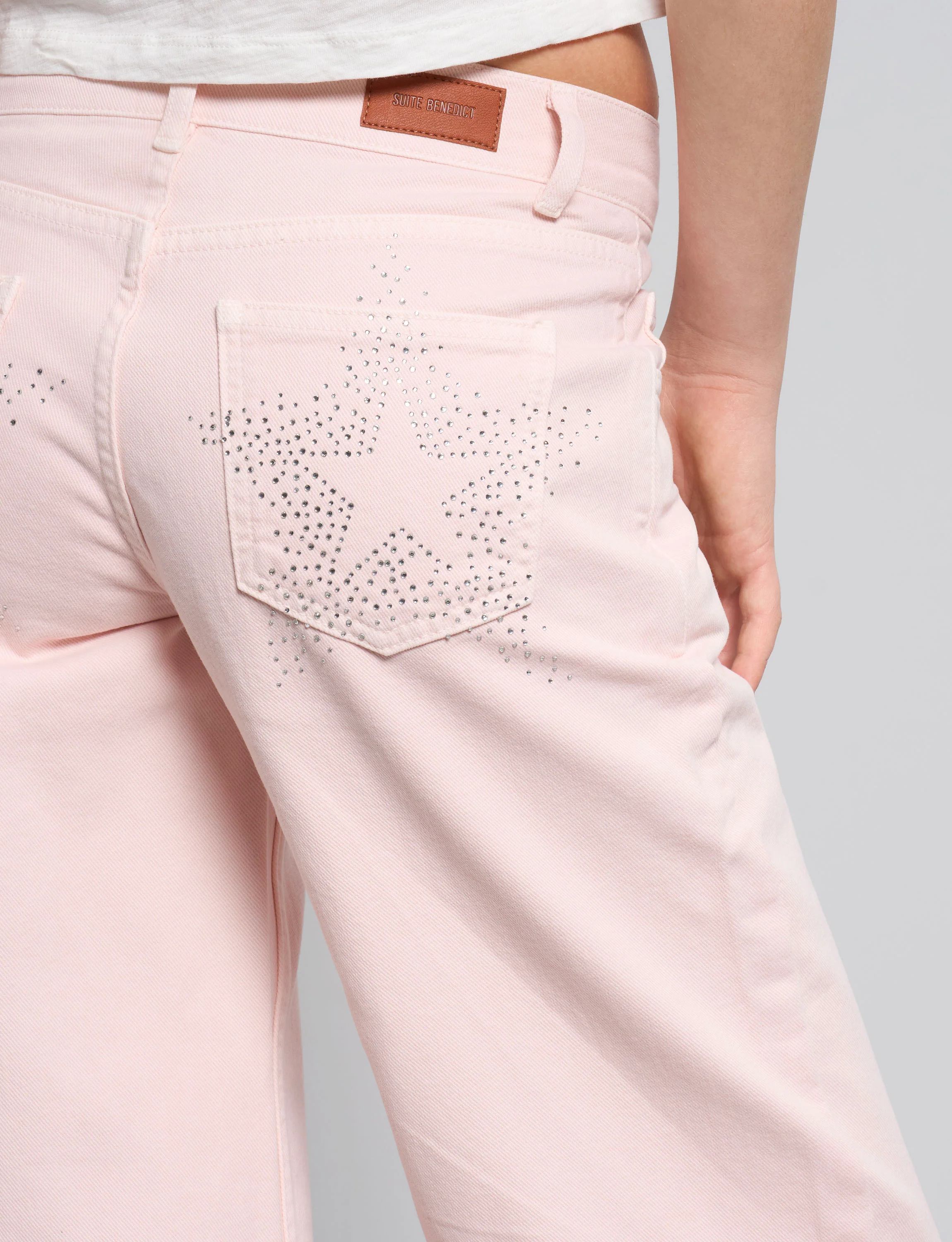Pantalone rosa straight con stelle in strass