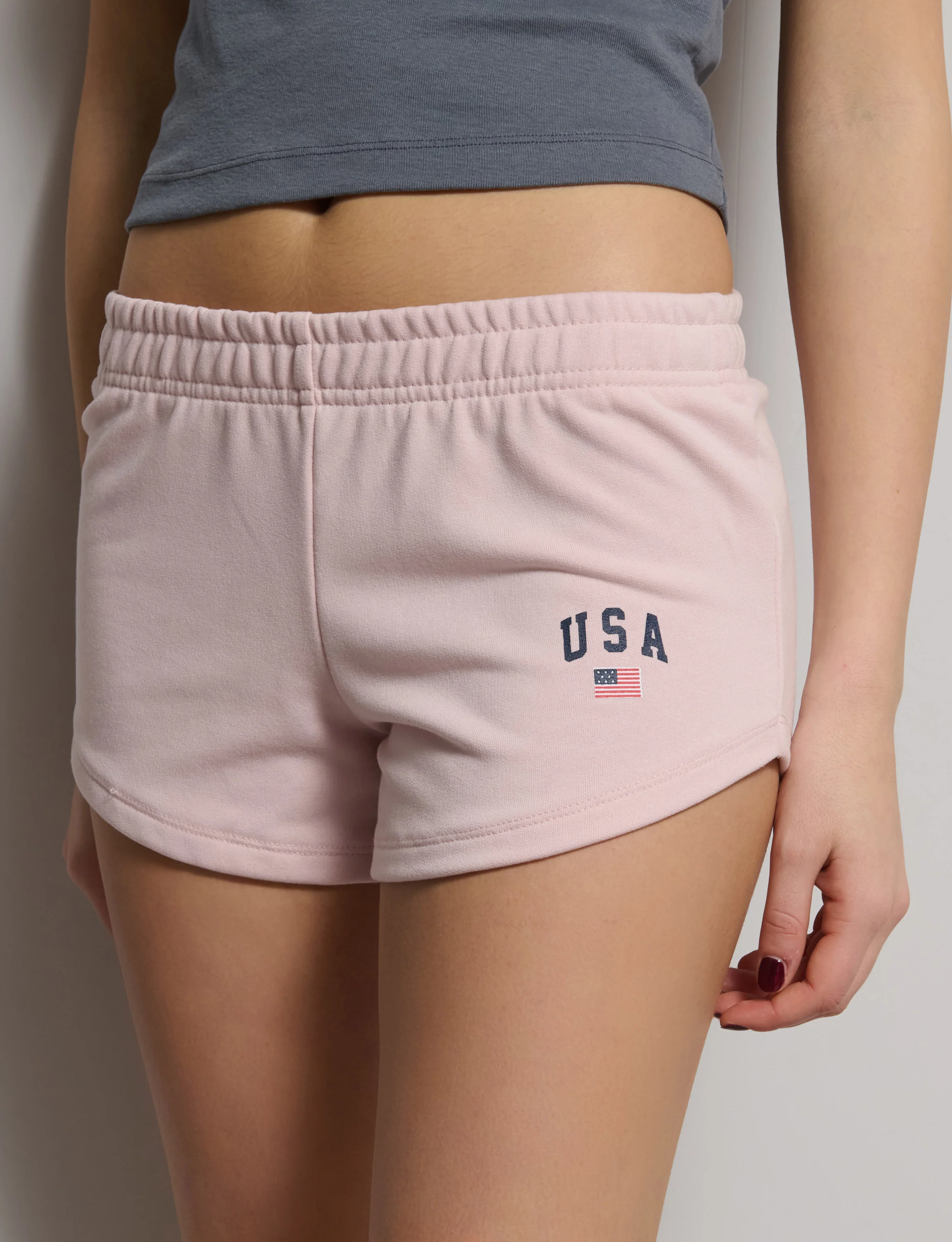 Short rosa in felpa con stampa USA